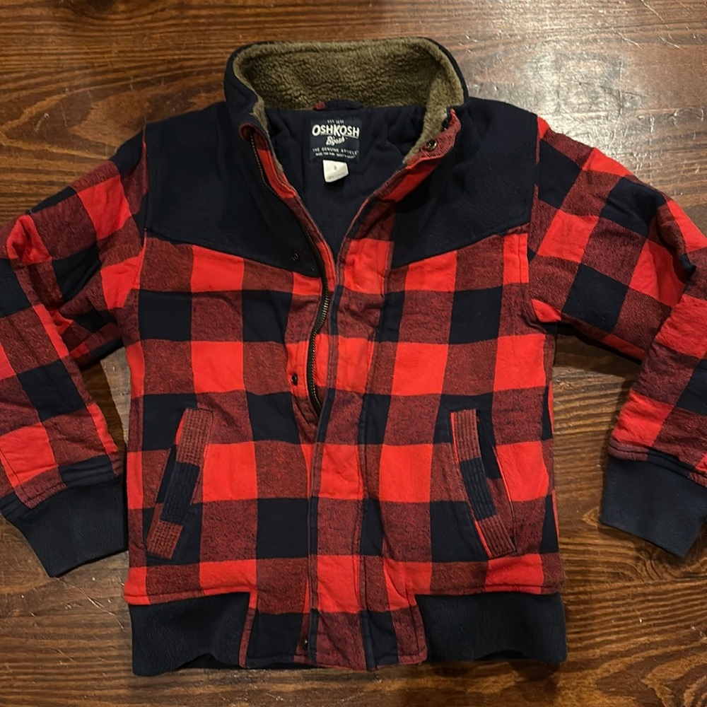 OshKosh red and black flannel coat. Soft lining. Super warm! Zipper & snap front